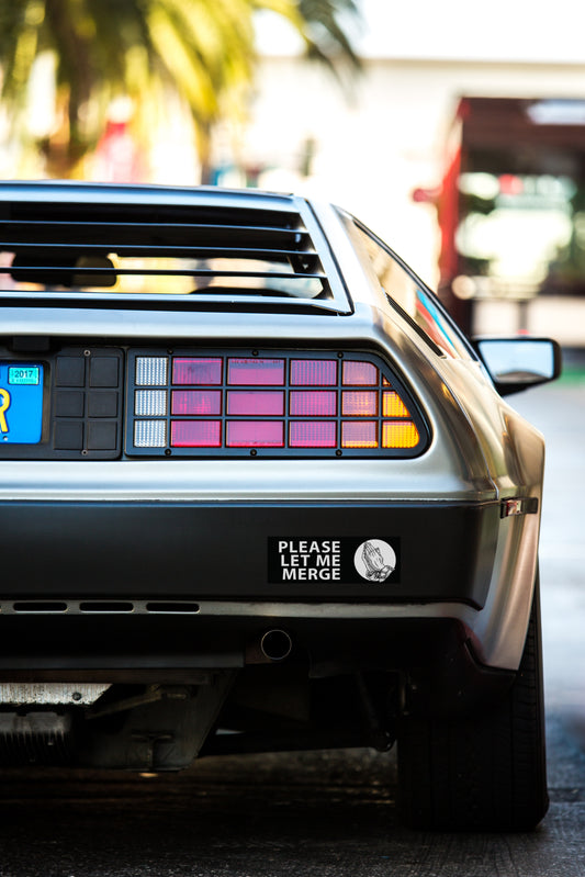 Please Let Me Merge Sticker on a car