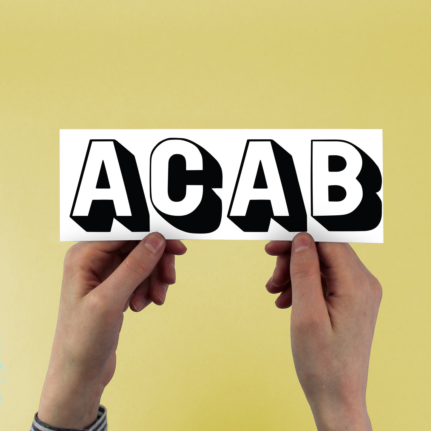 acab sticker held