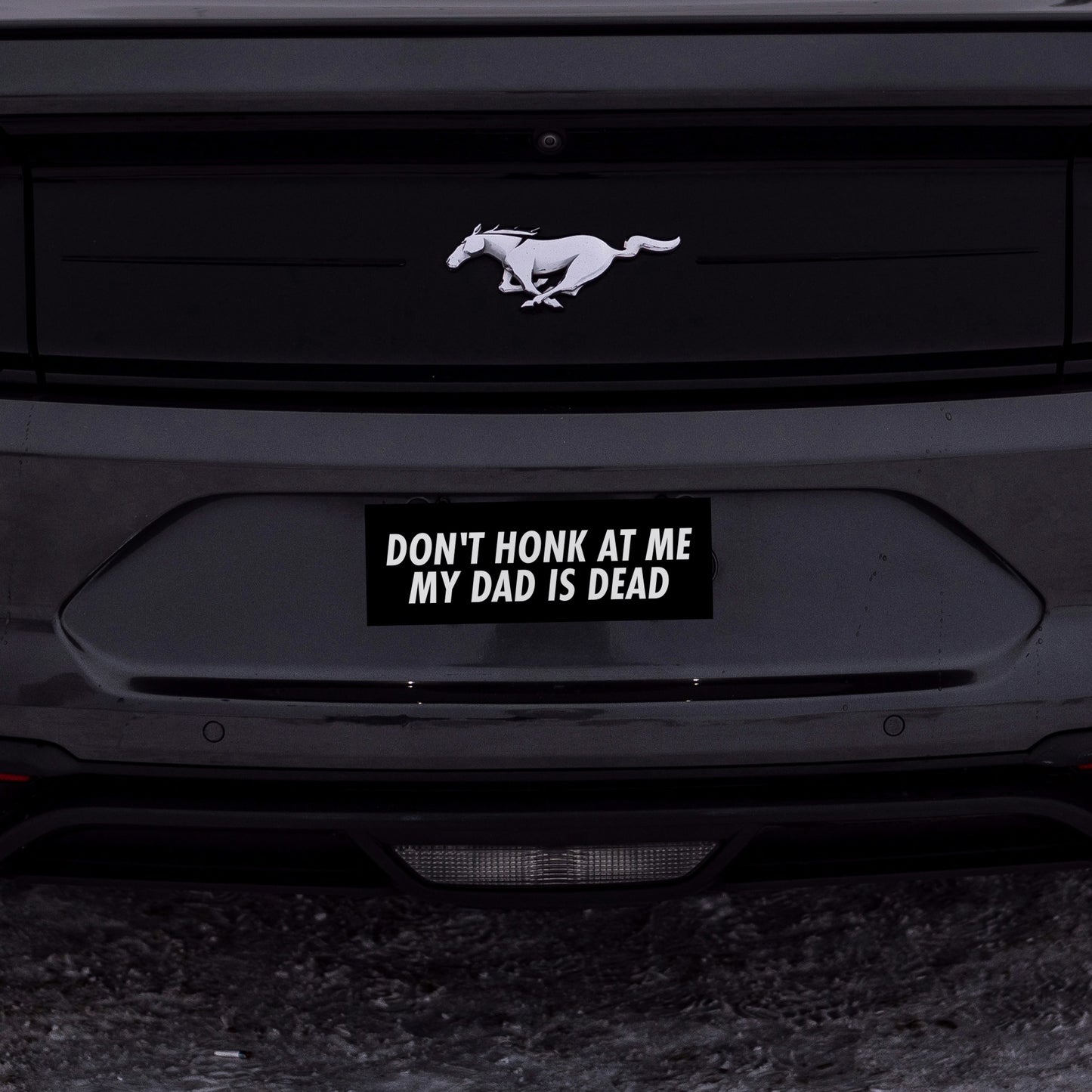 don't honk at me my dad is dead bumper sticker on car